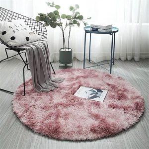 Alfombra redonda de pelo largo rosa para dormitorio